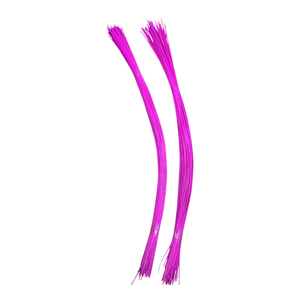 Hot pink Midelino sticks being used to create a decorative collar for a hand-tied bouquet, adding height and texture.