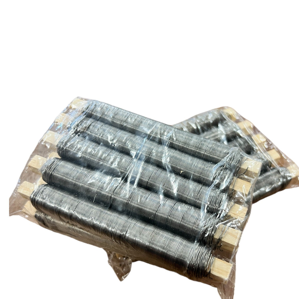 Bulk 100g black florist mossing wire rolls on wooden sticks for eco-friendly wreath making and seasonal floral design.