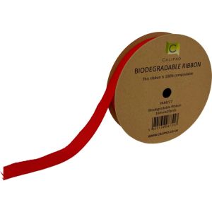 Roll of red biodegradable ribbon on a cardboard reel with a visible brand label.