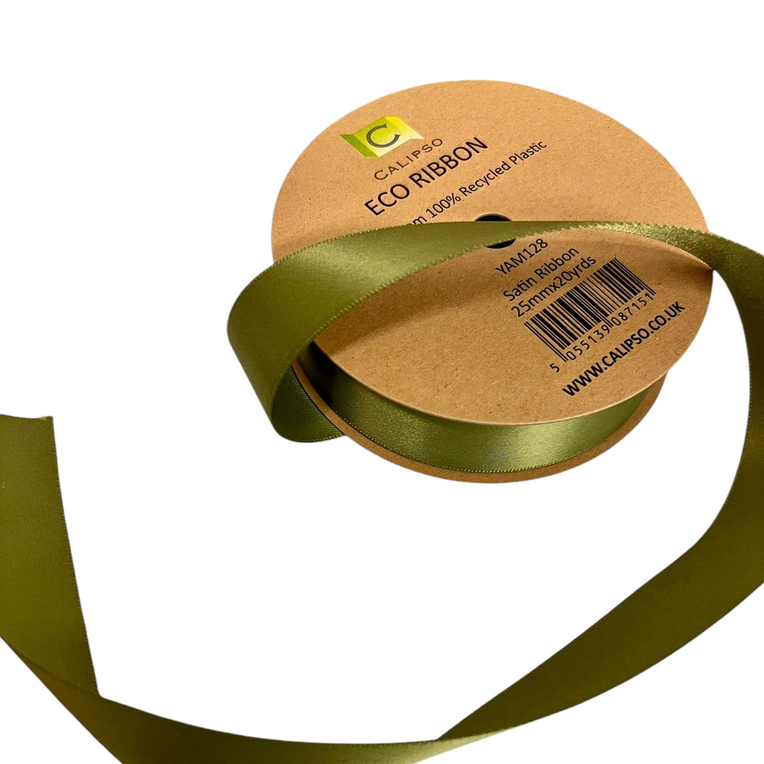 A roll of sage moss green recycled plastic ribbon with the brand label &