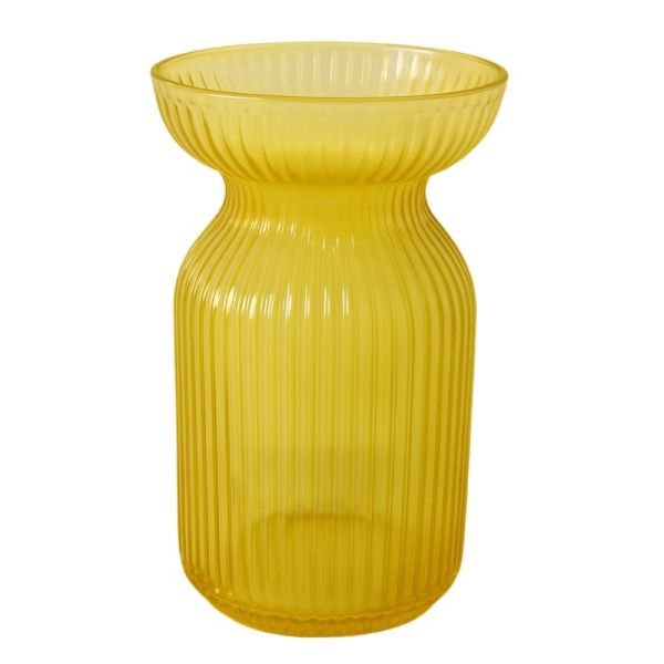 Yellow glass vase with ribbed texture on a white background