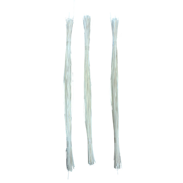 Three bundles of thin Midelino Sticks white on a white background