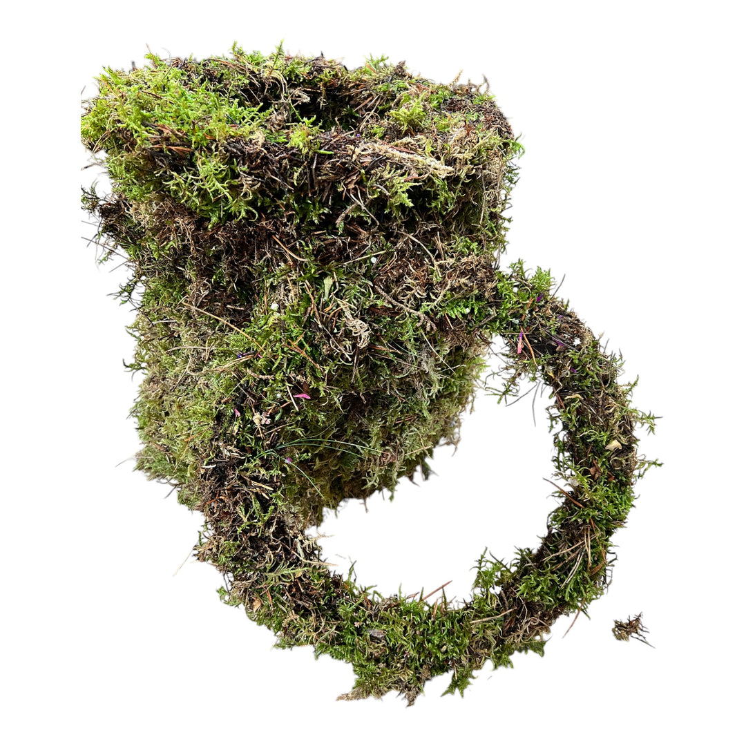 A flat  wreath base made of sustainably sourced Norfolk moss, intended for crafting and floral arrangements.