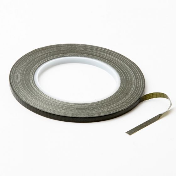 A roll of olive green pot tape with some tape unrolled, on a plain background.