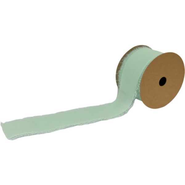 A roll of mint green chiffon ribbon with a frayed edge displayed against a white background