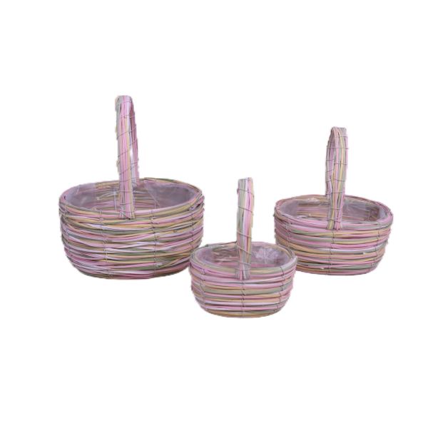 Three woven baskets with handles on a white background