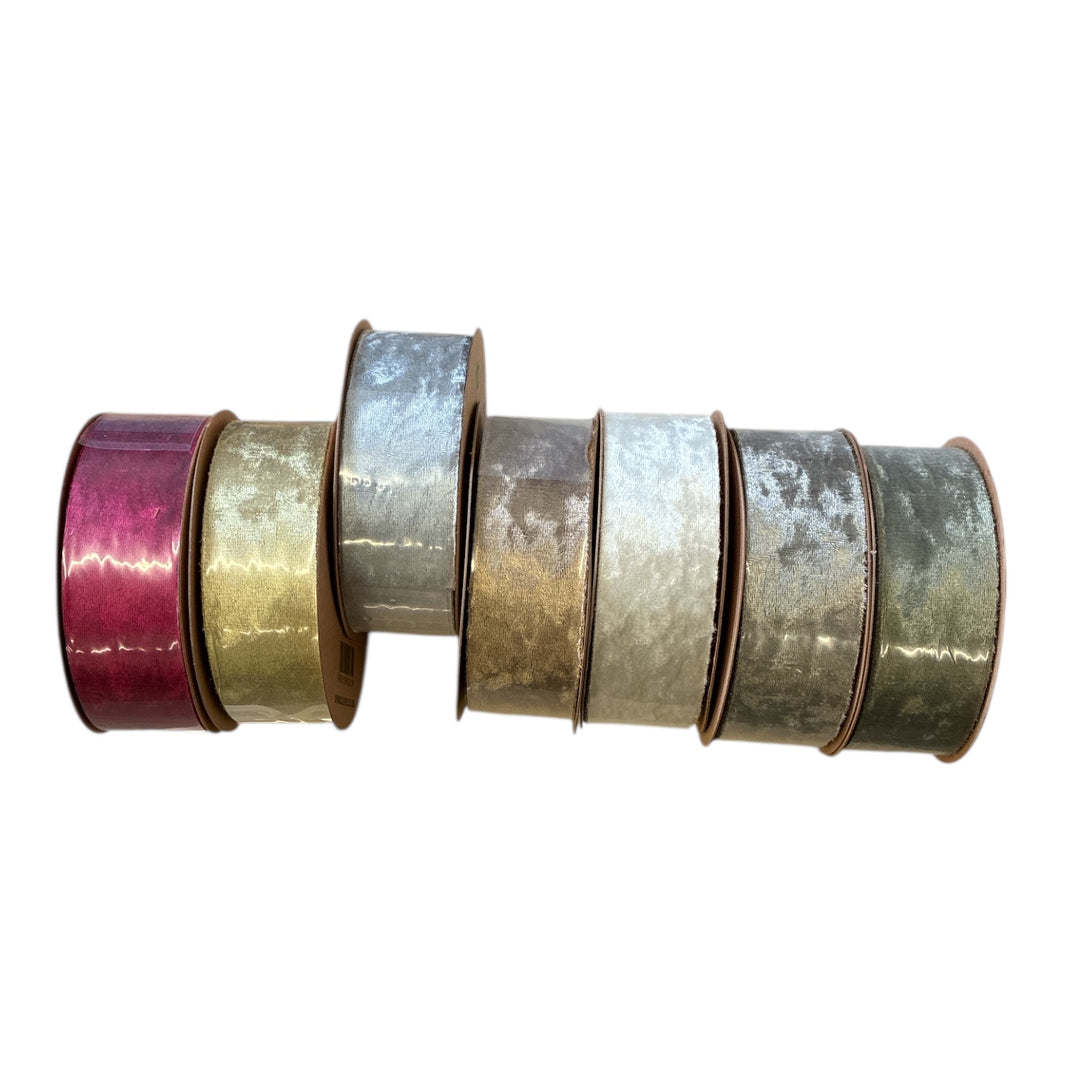 Set of metallic ribbons in various colors on a white background