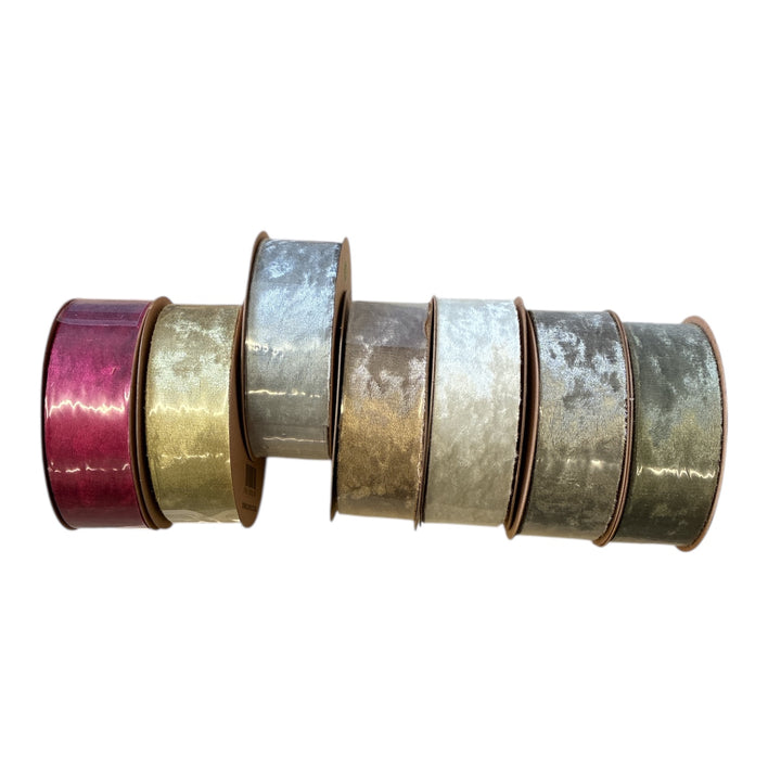 Set of metallic ribbons in various colors on a white background