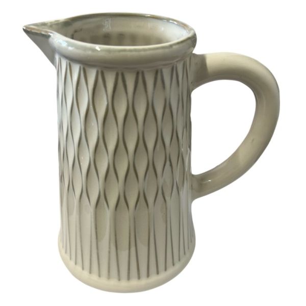 A beige stoneware jug with a geometric pattern and a natural unglazed base.