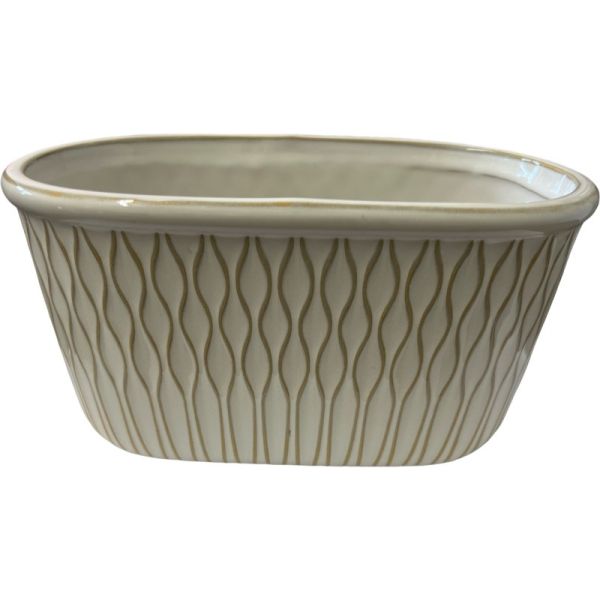 An oval-shaped, ivory-colored stoneware planter with a textured design.