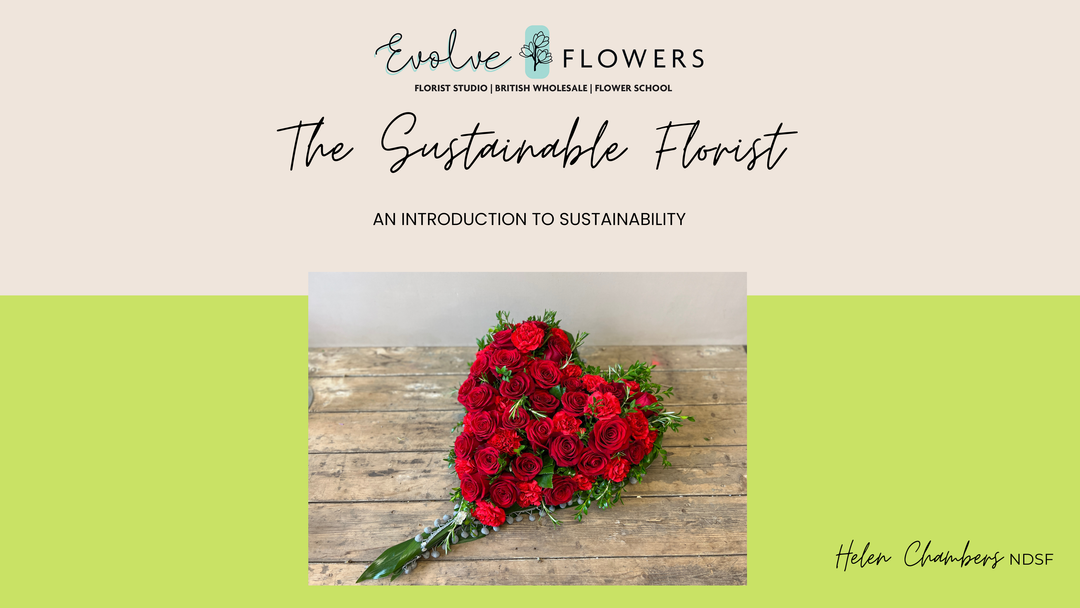 Promotional image for 'The Sustainable Florist' masterclass featuring a heart-shaped arrangement of red flowers with green leaves, placed on a wooden surface with a logo and name 'Evolve Flowers' at the top.