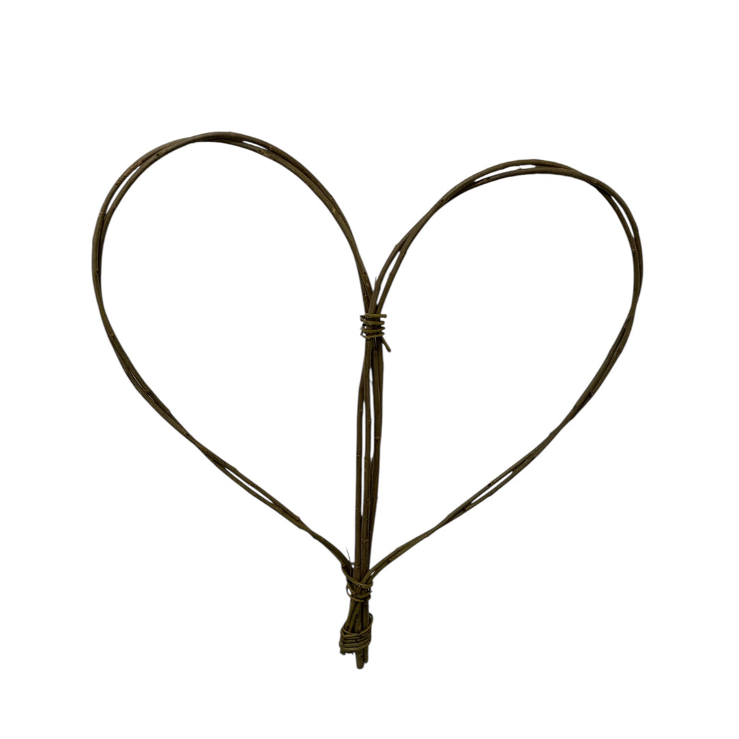 Heart-shaped object made of intertwined ropes on a white background