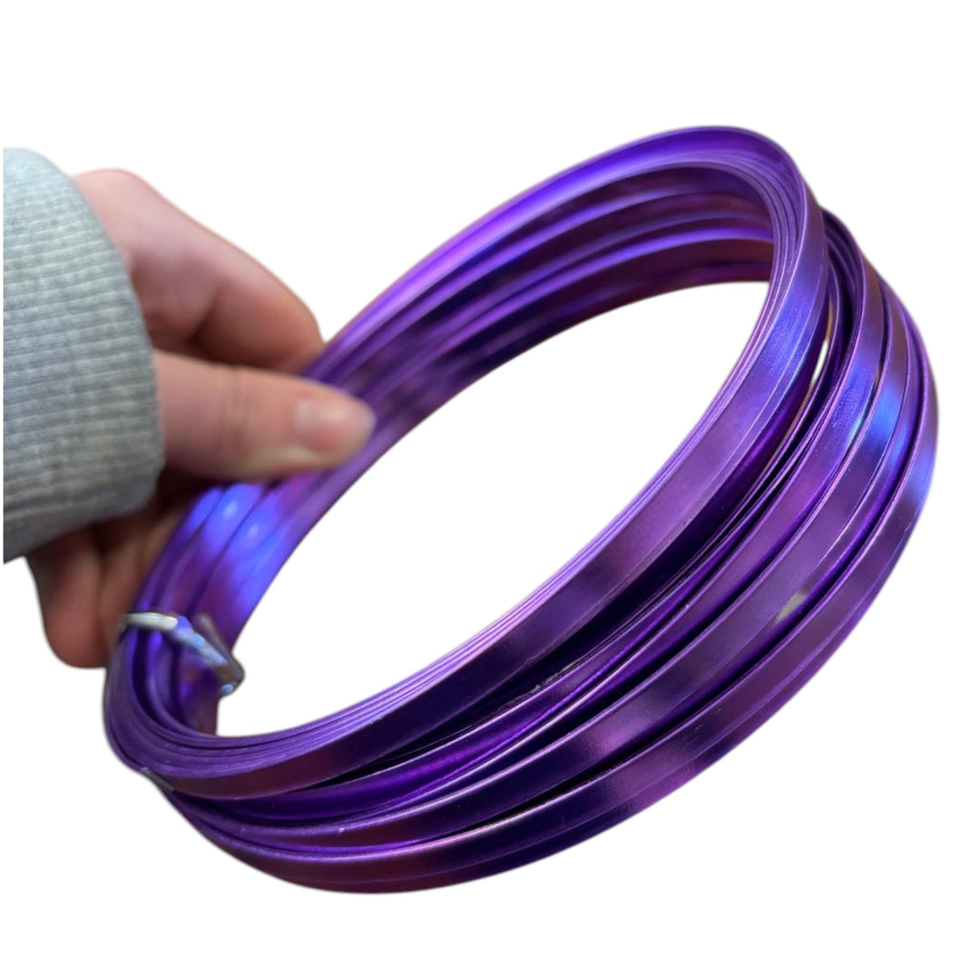 A spool of Wire - Aluminium -100g purple flat