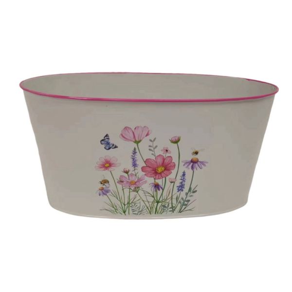 An oval-shaped zinc pot with a floral design, featuring pink, purple, and yellow flowers, and butterflies.