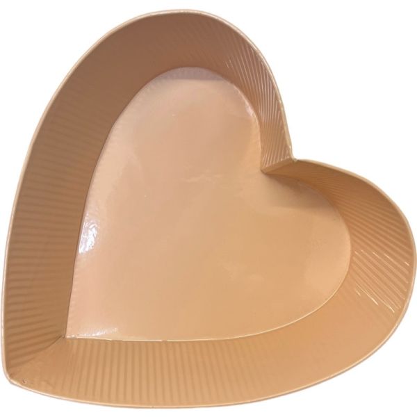A heart-shaped, beige zinc planter with a ribbed texture and a smooth finish.
