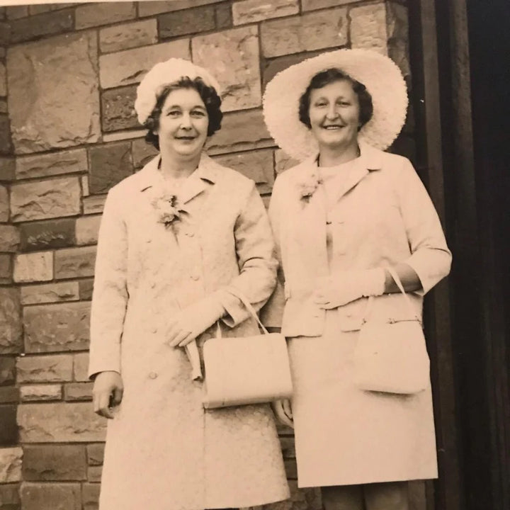 Black and white vintage photograph of the real Hilda with family, the inspiration behind the Spinsterz Hilda MidiGaunt glove.