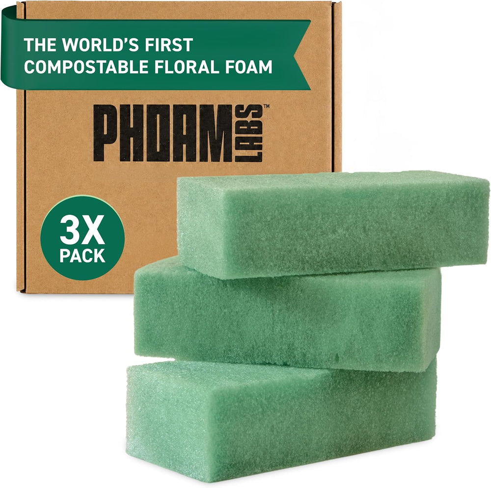 A 3-pack box of Phoam compostable green floral foam blocks stacked alongside the packaging.